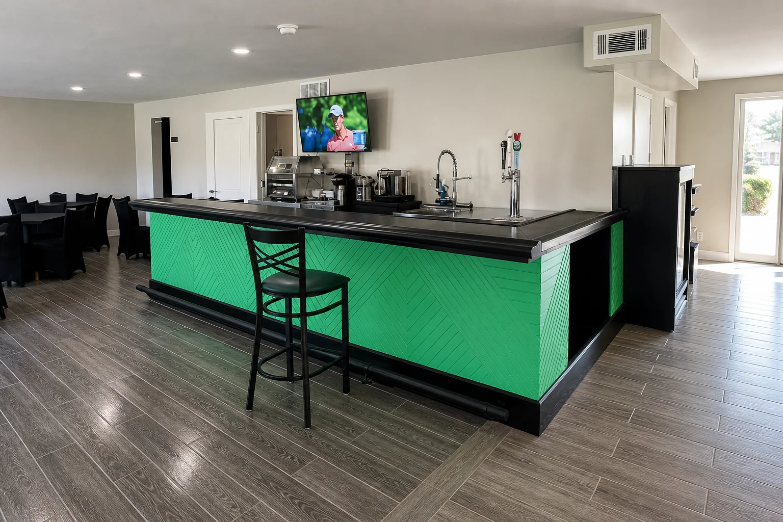 Commercial hospitality bar with bright green custom millwork